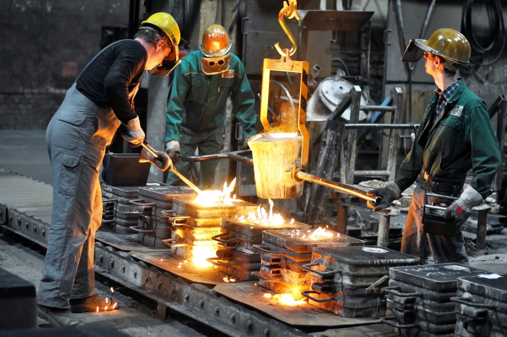 workers-in-a-foundry-casting-a-metal-workpiece